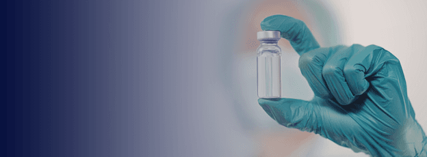 Doctor holding vial